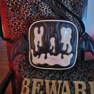 Limited Edition Love, Pain, & Stitches Batwing Bag